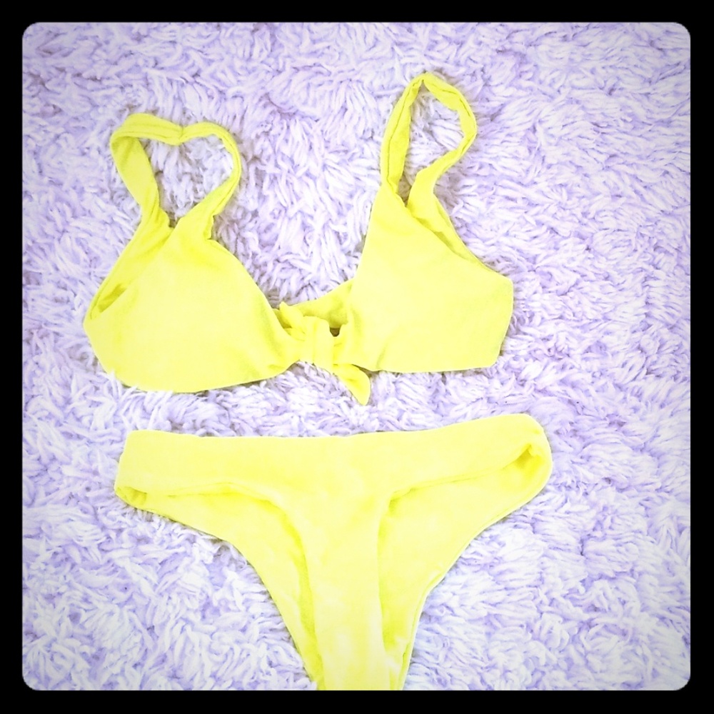 Neon yellow swimsuit high-waisted.